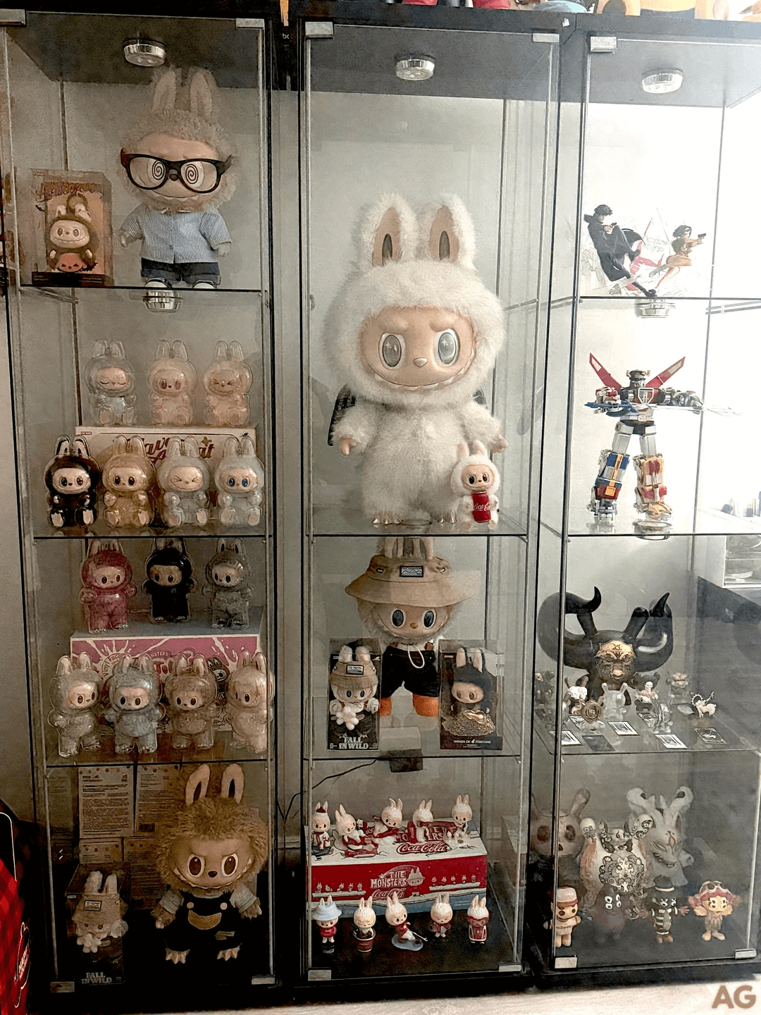 Collector's shelf featuring multiple Labubu Sanrio figures