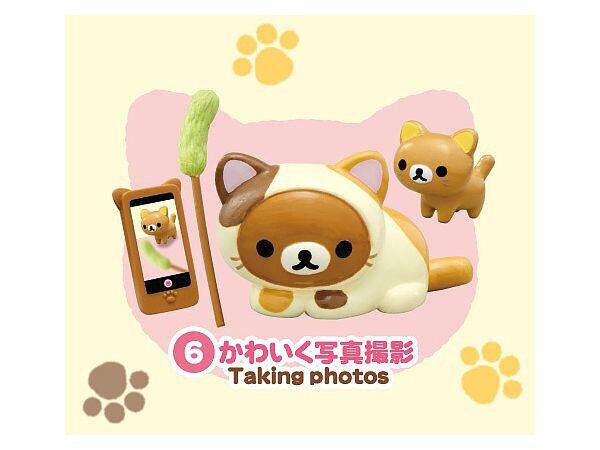 Shop owner helping a customer select Chiikawa blind boxes